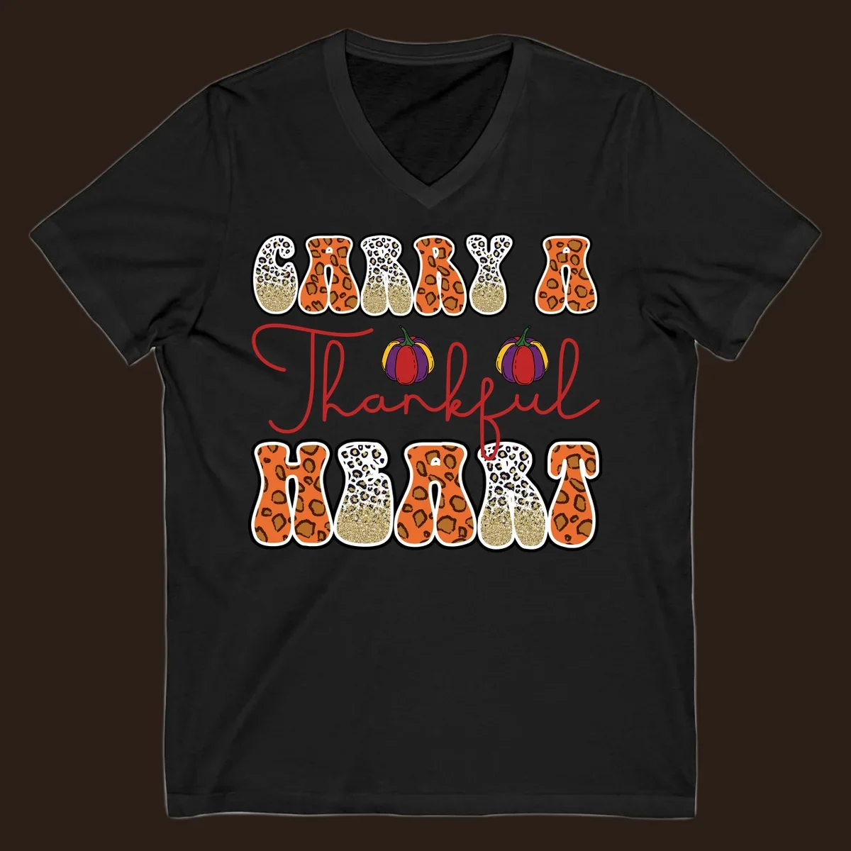 Carry A Thankful Heart design with leopard print letters and pumpkins.