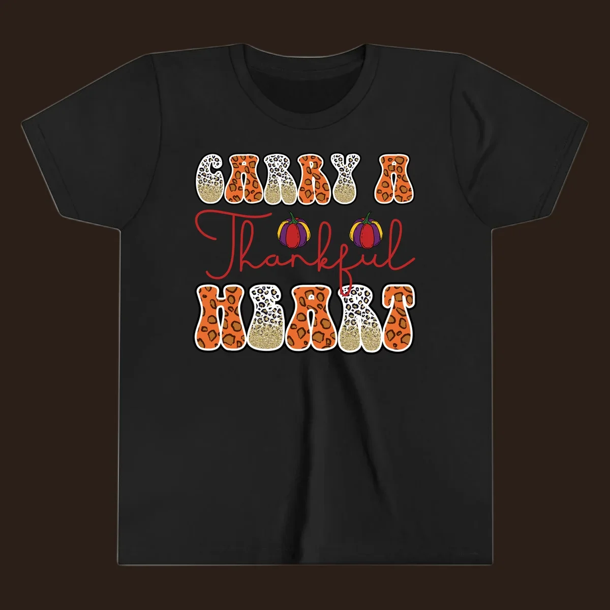 Carry A Thankful Heart design with leopard print letters and pumpkins.