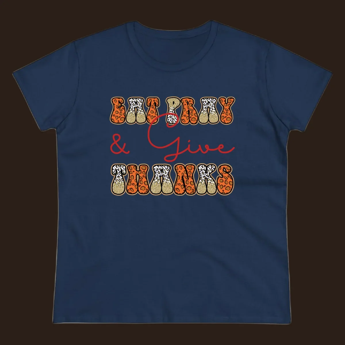 Eat Pray Give Thanks leopard print text design with gold glitter accents.