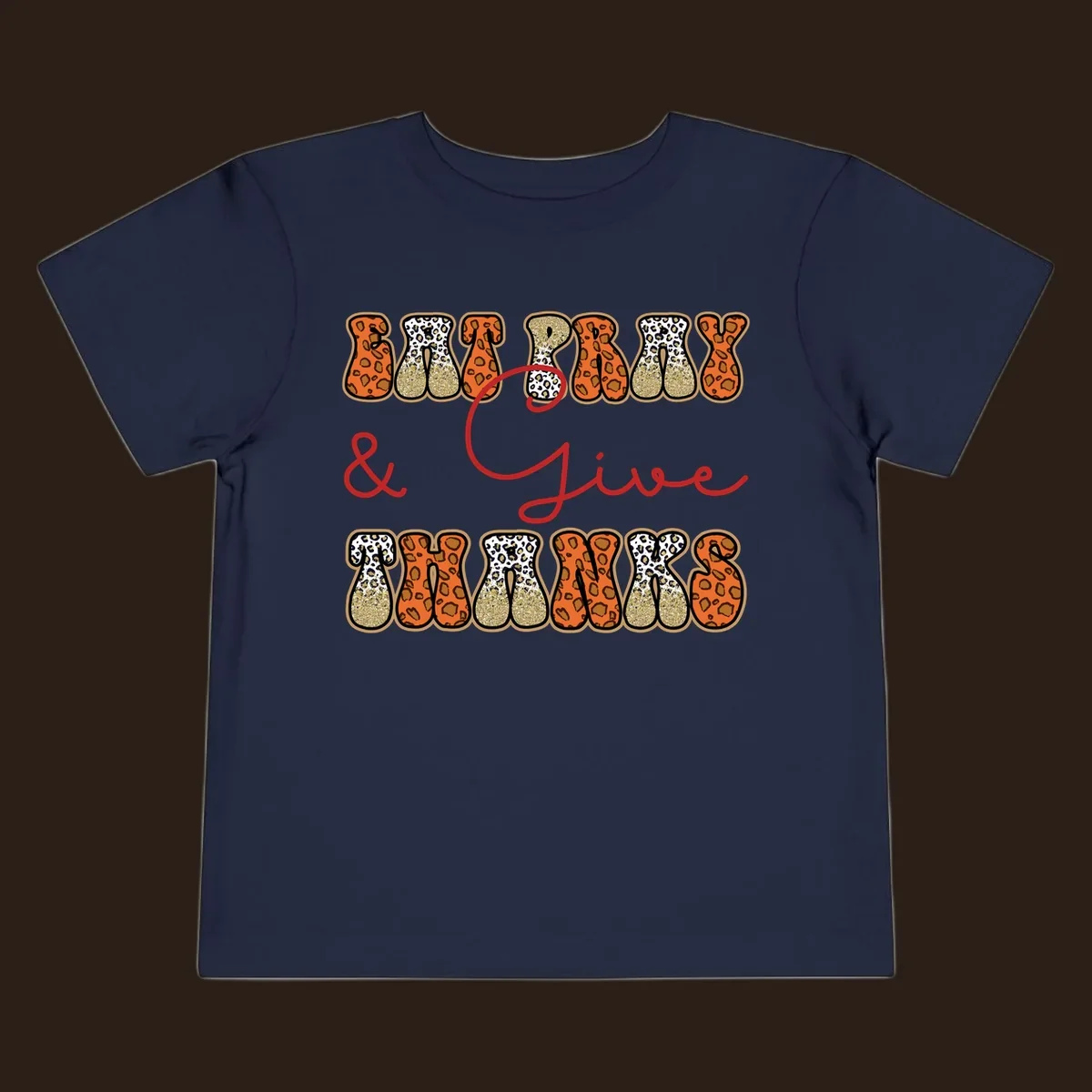Eat Pray Give Thanks leopard print text design with gold glitter accents.