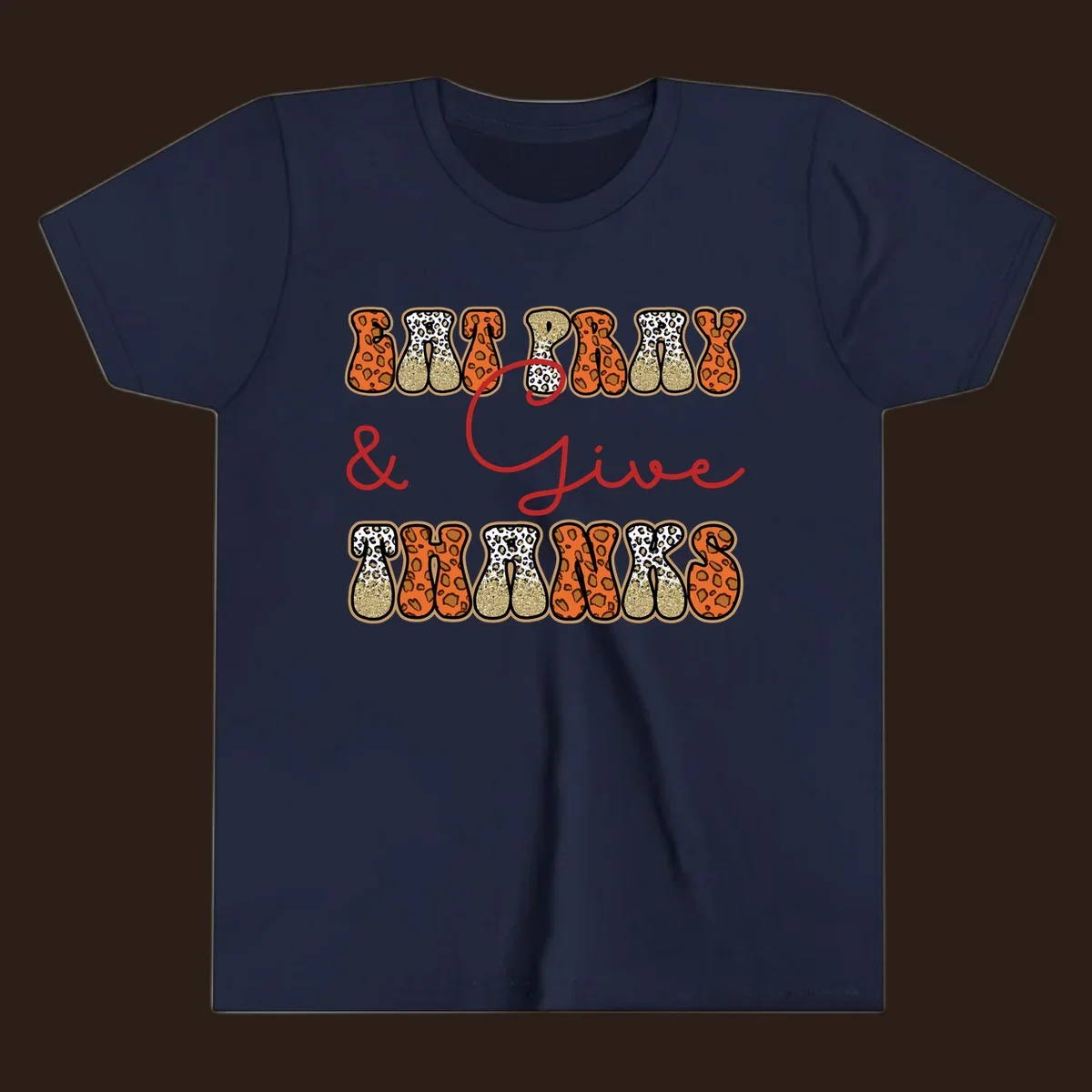 Eat Pray Give Thanks leopard print text design with gold glitter accents.