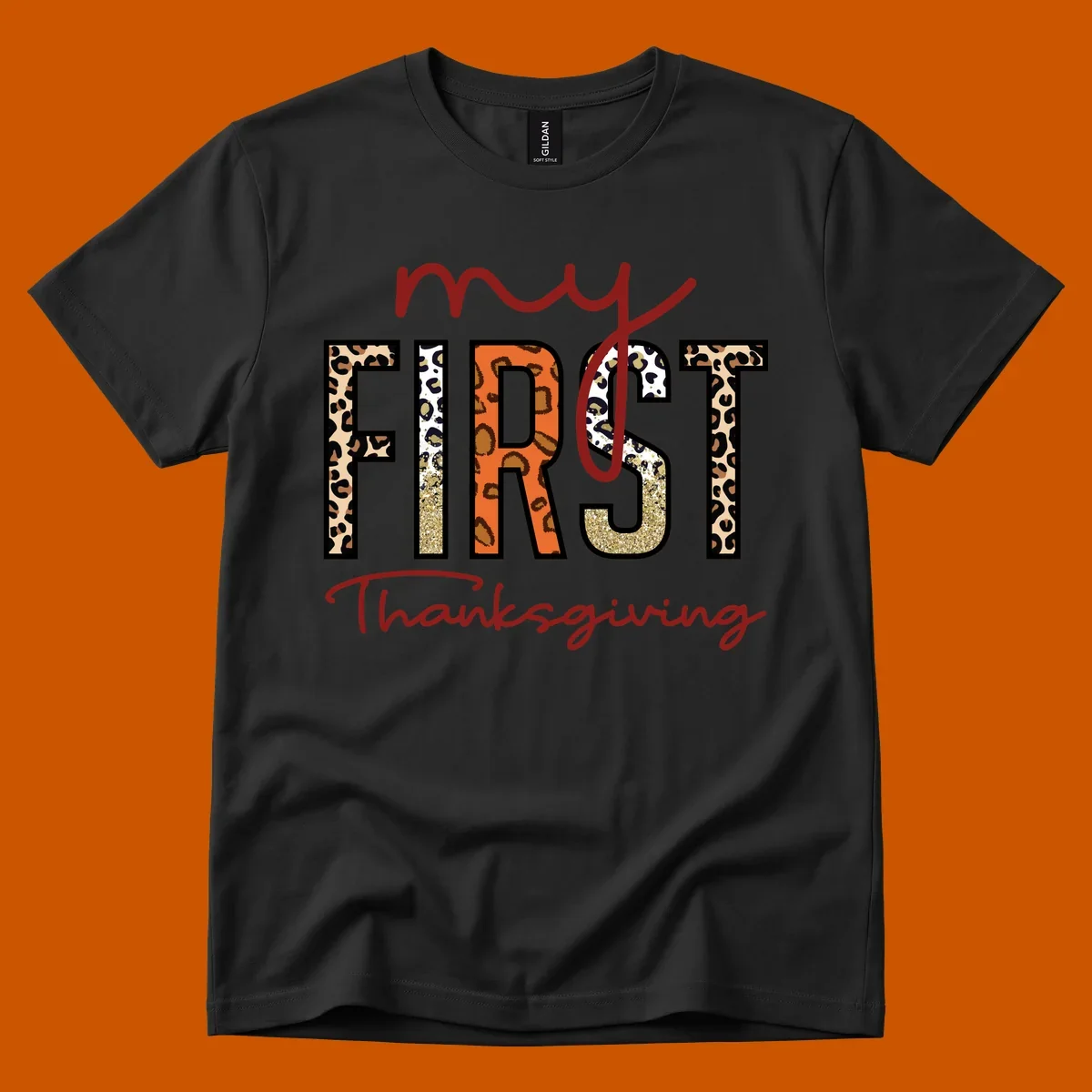 Baby's first Thanksgiving text with leopard print and glitter elements.