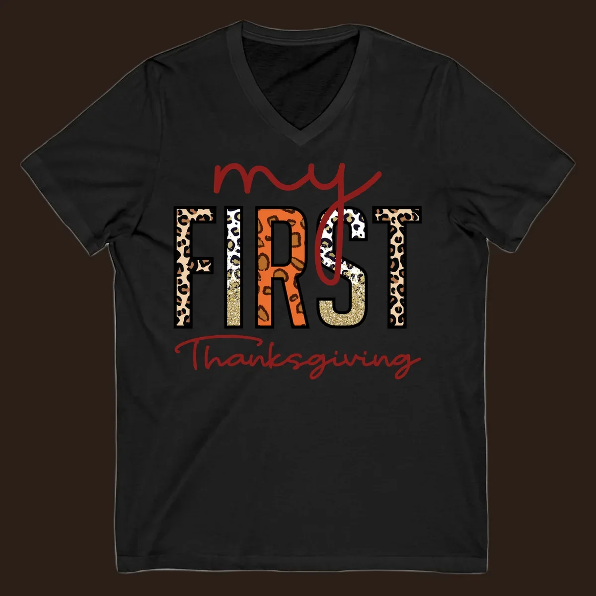 Baby's first Thanksgiving text with leopard print and glitter elements.