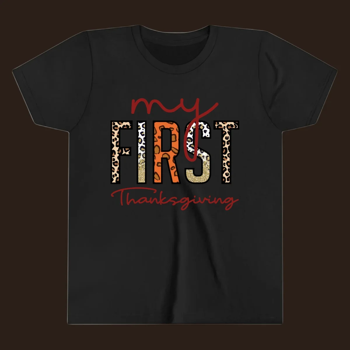 Baby's first Thanksgiving text with leopard print and glitter elements.