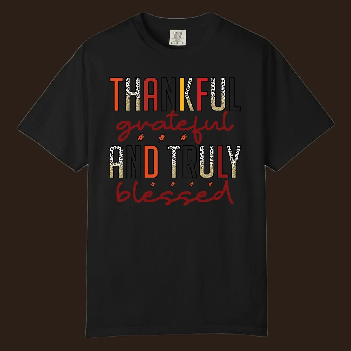 Thankful grateful and truly blessed typography with fall leaf and leopard print accents.