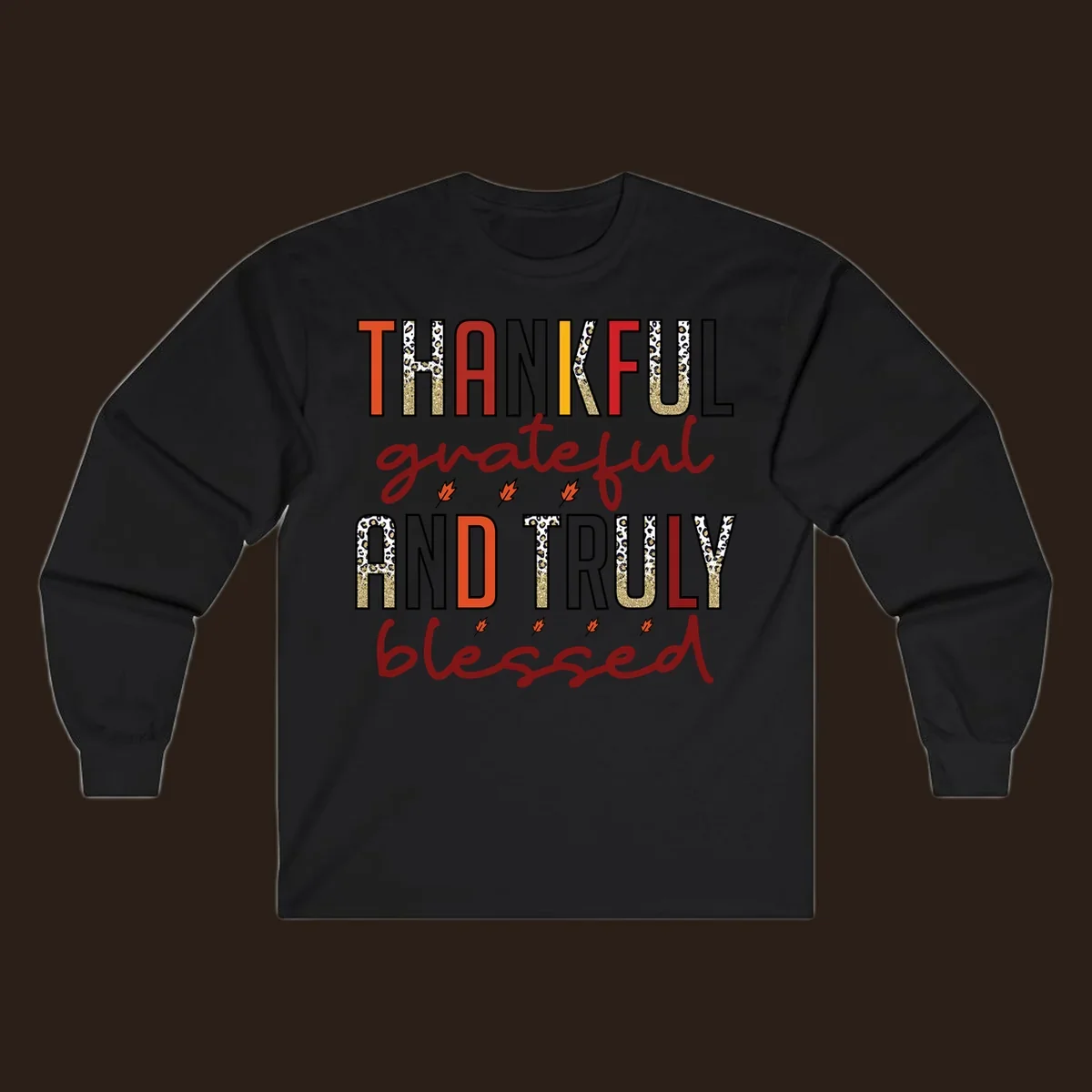 Thankful grateful and truly blessed typography with fall leaf and leopard print accents.