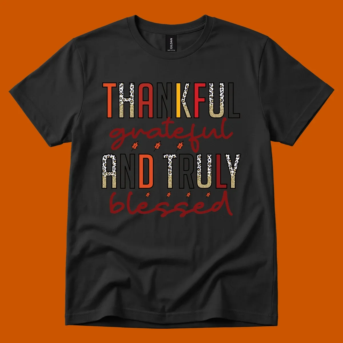 Thankful grateful and truly blessed typography with fall leaf and leopard print accents.