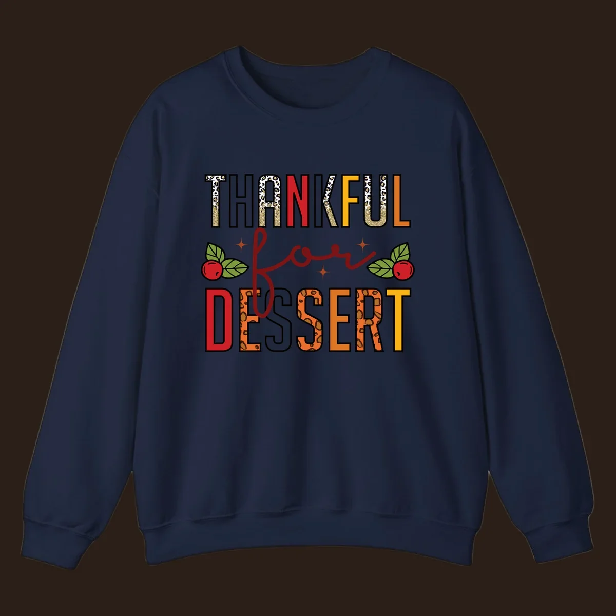 Thankful for Dessert typography with leopard print and cranberries on a dark background.