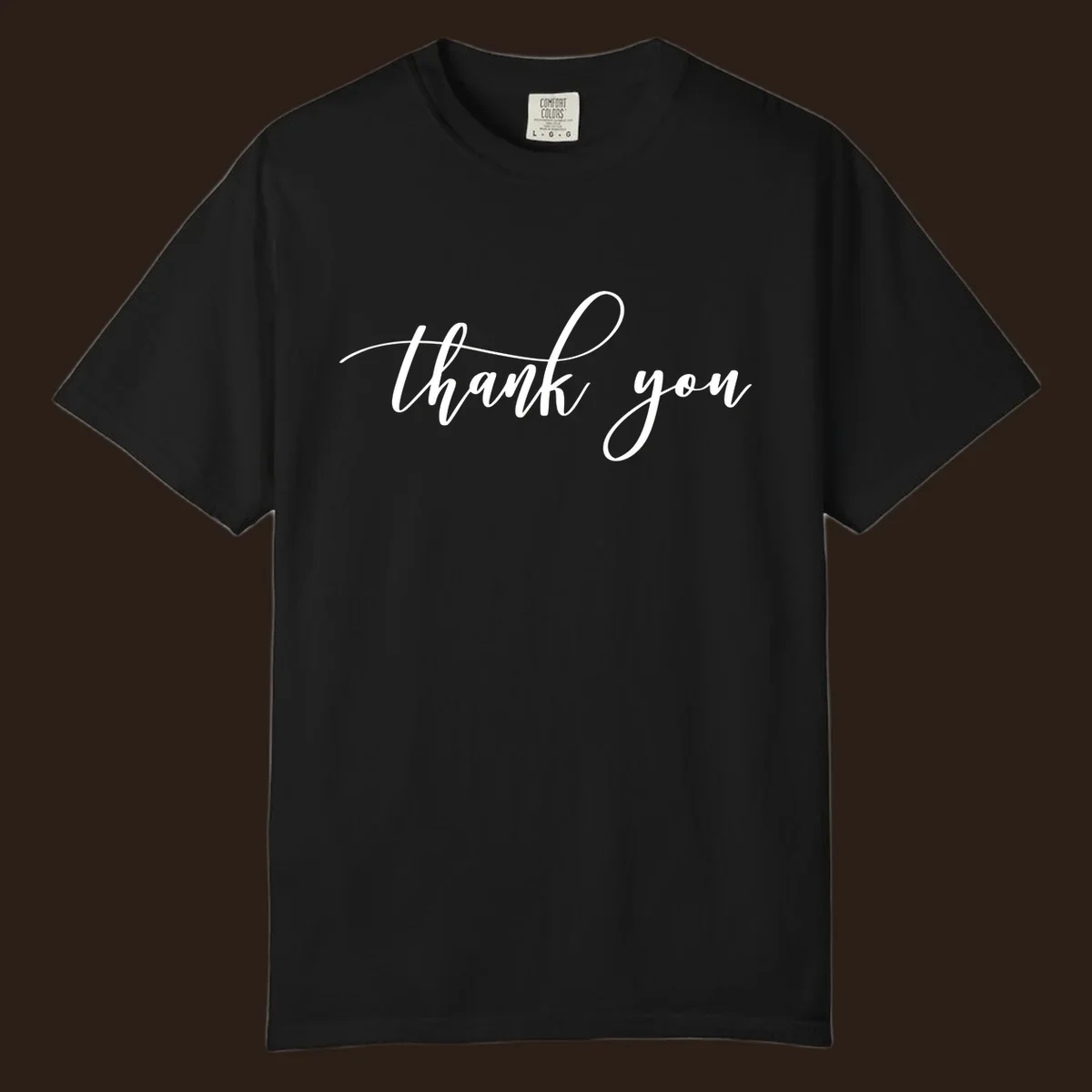 Elegant handwritten thank you script in white on a dark background.