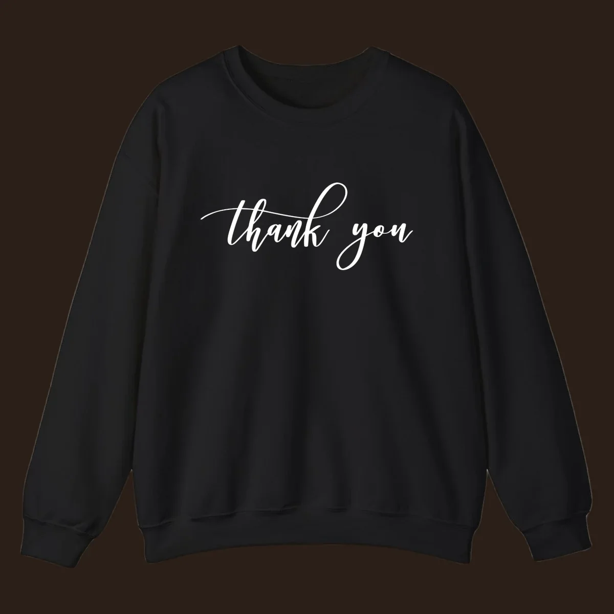 Elegant handwritten thank you script in white on a dark background.
