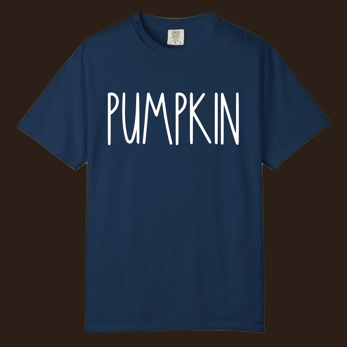 White text design that says PUMPKIN in a bold, hand-drawn font on a black background.