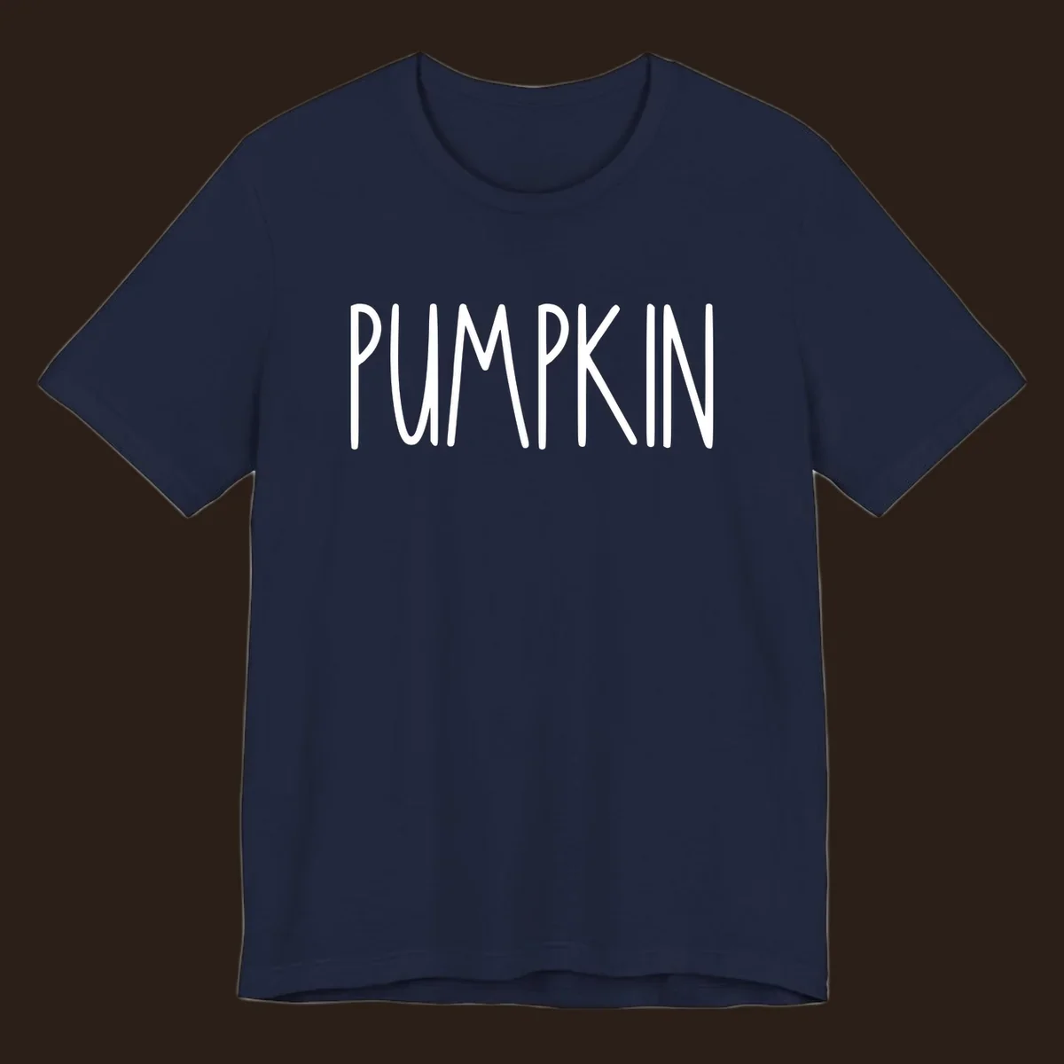 White text design that says PUMPKIN in a bold, hand-drawn font on a black background.