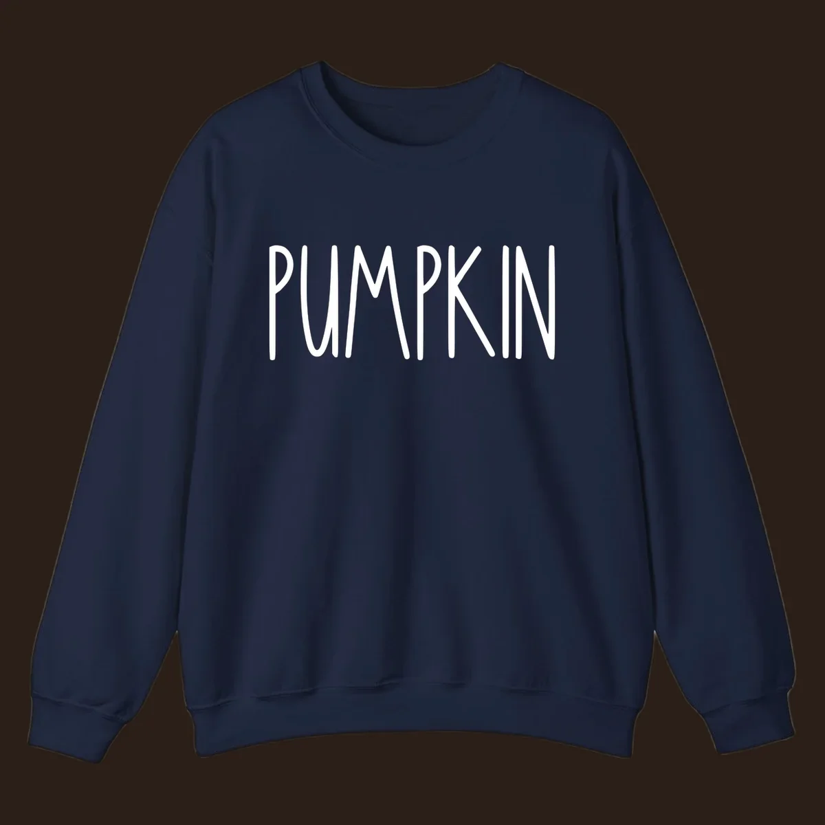 White text design that says PUMPKIN in a bold, hand-drawn font on a black background.