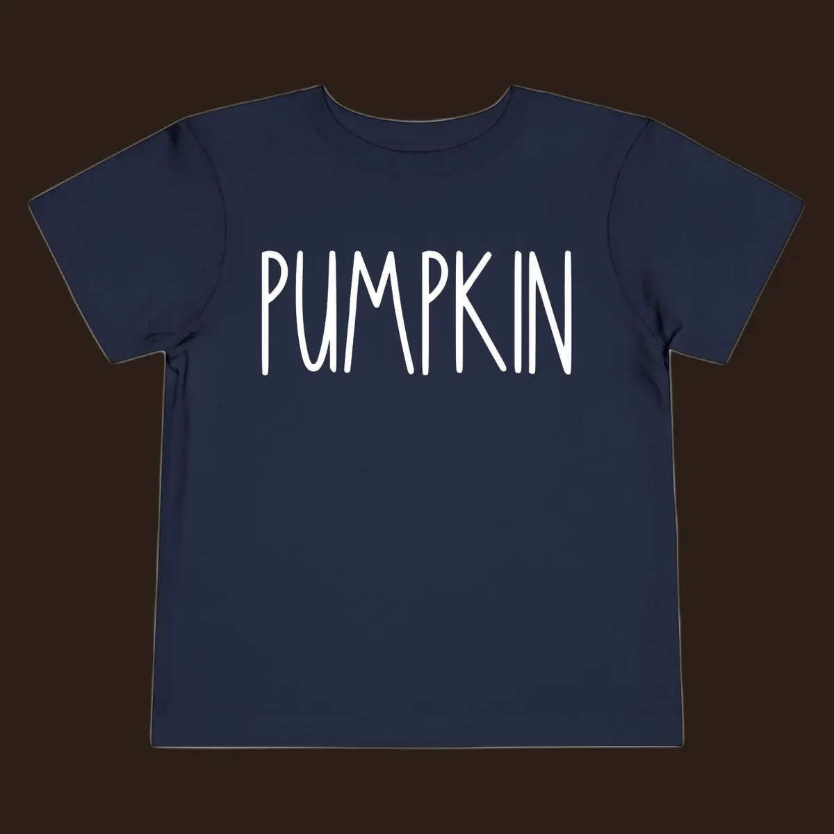 White text design that says PUMPKIN in a bold, hand-drawn font on a black background.