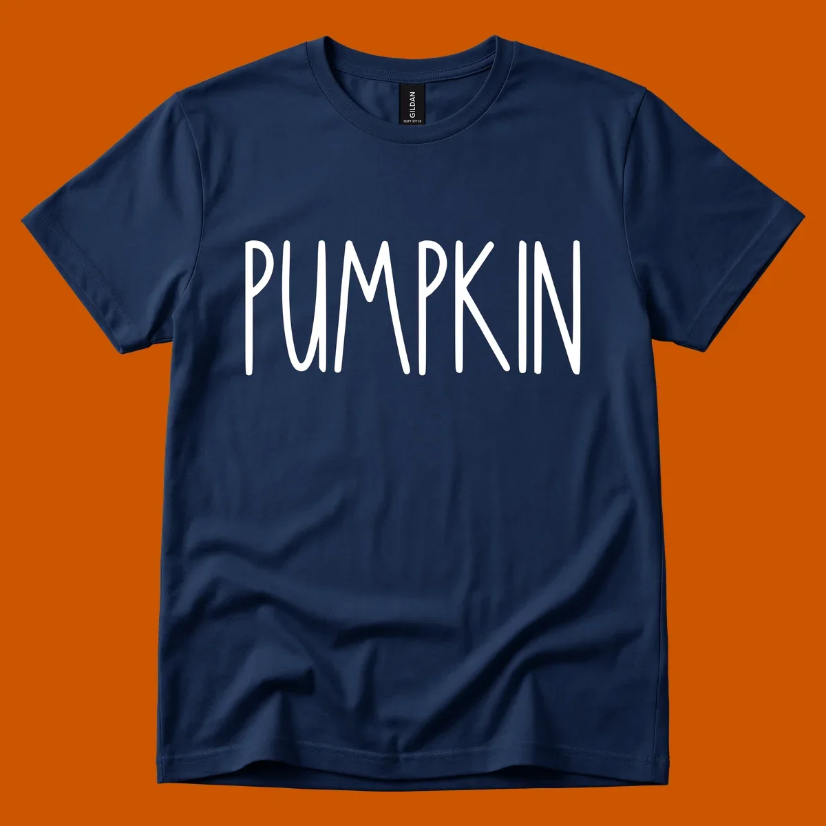 White text design that says PUMPKIN in a bold, hand-drawn font on a black background.