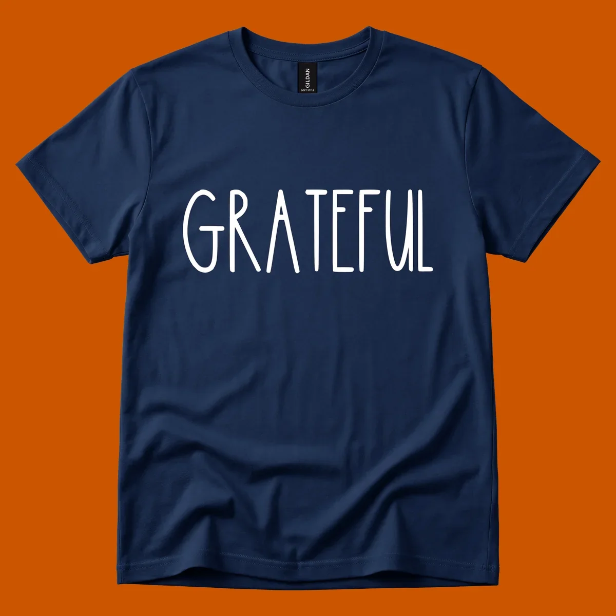 Bold white typography spelling out GRATEFUL, suitable for Thanksgiving.