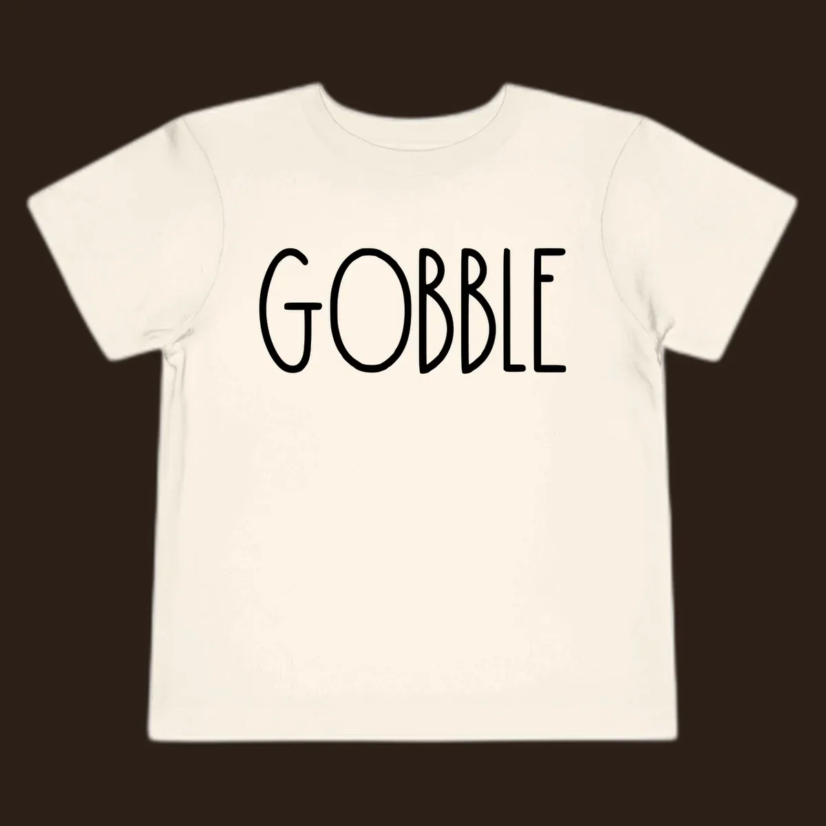 Gobble Thanksgiving text design in white on a dark background.