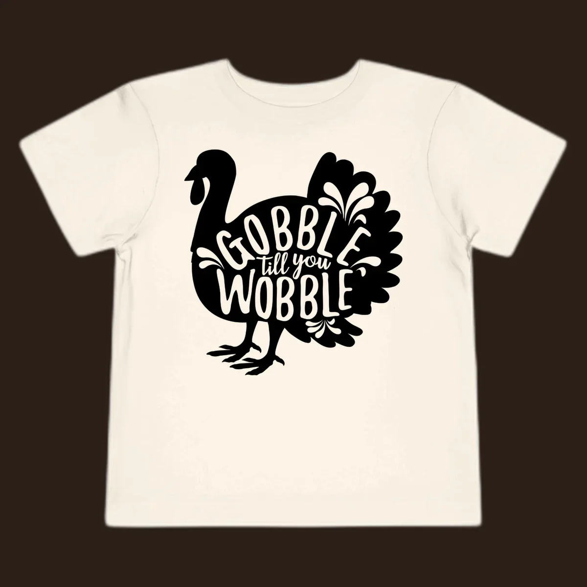 Gobble wobble turkey design with text for Thanksgiving.
