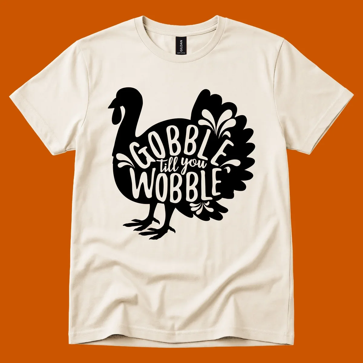 Gobble wobble turkey design with text for Thanksgiving.