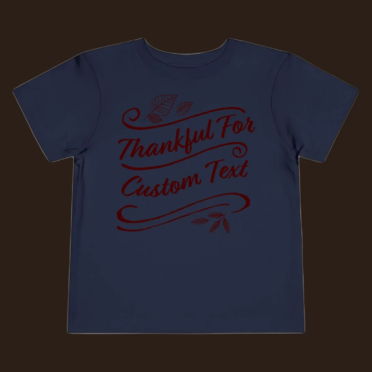 Custom Thanksgiving text with leaves and swirls, dark red on black or white.
