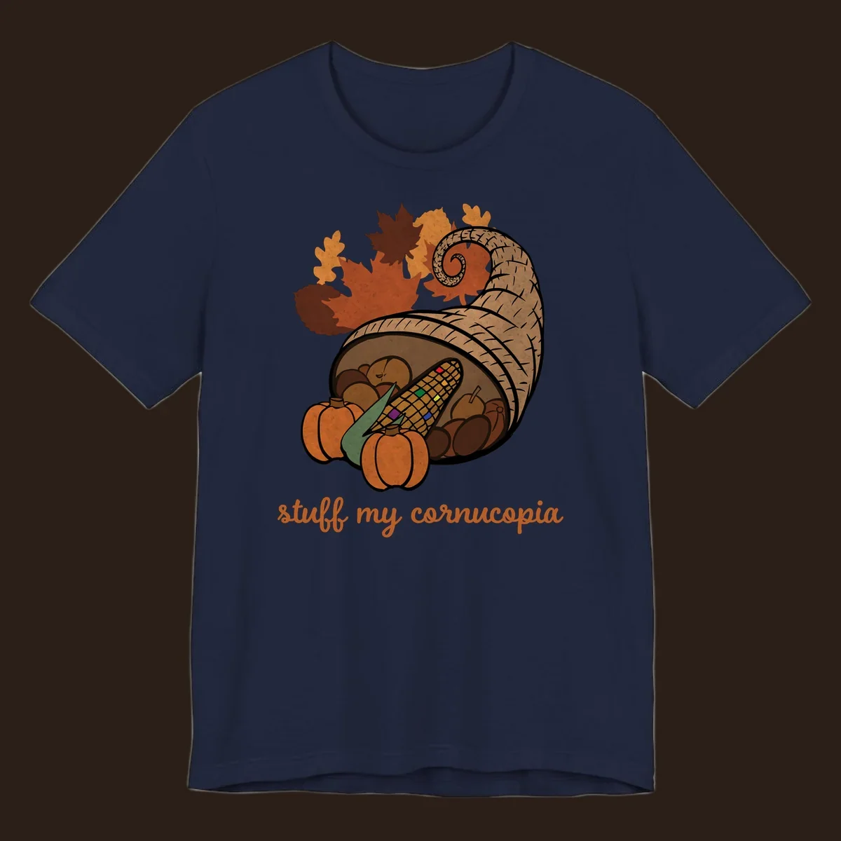 Cornucopia overflowing with harvest food and autumn leaves, with text 'stuff my cornucopia'.
