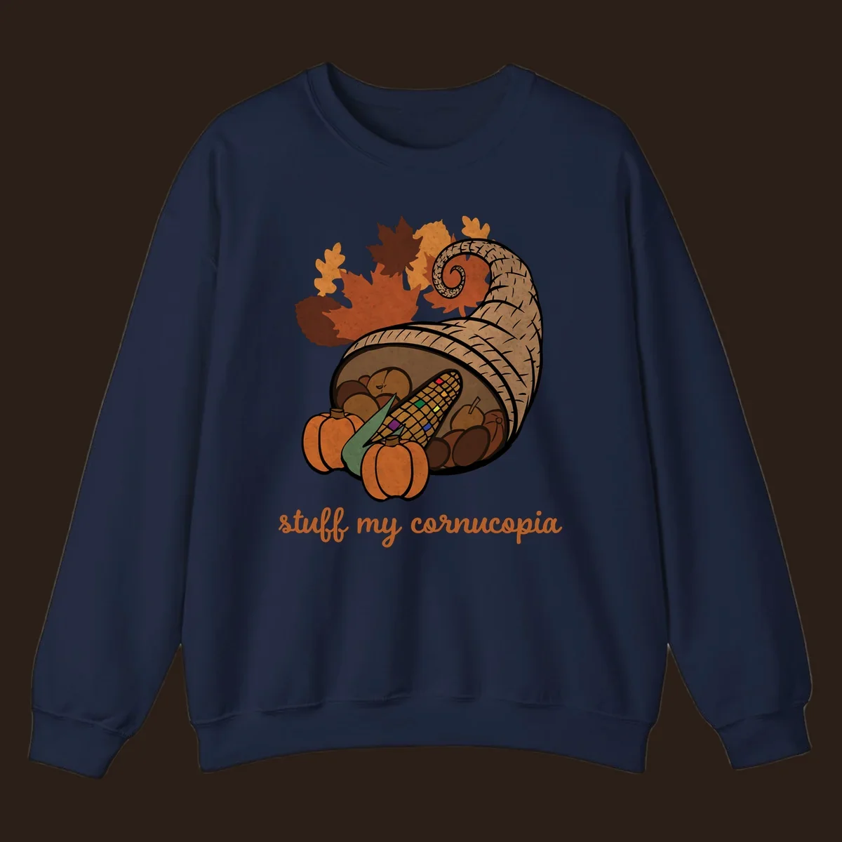 Cornucopia overflowing with harvest food and autumn leaves, with text 'stuff my cornucopia'.