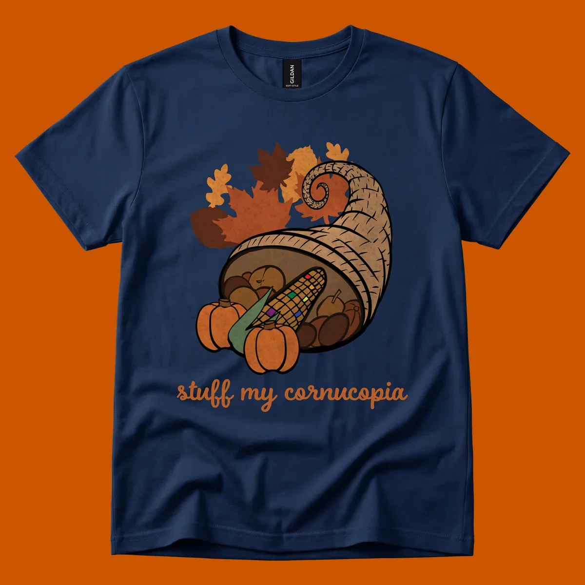 Cornucopia overflowing with harvest food and autumn leaves, with text 'stuff my cornucopia'.