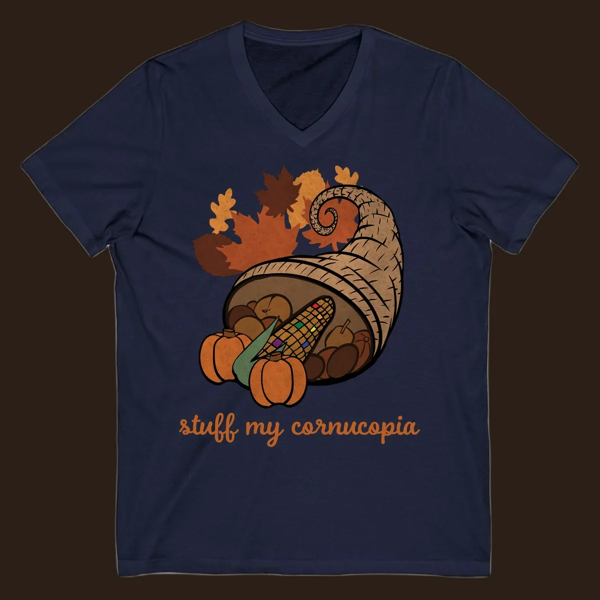 Cornucopia overflowing with harvest food and autumn leaves, with text 'stuff my cornucopia'.