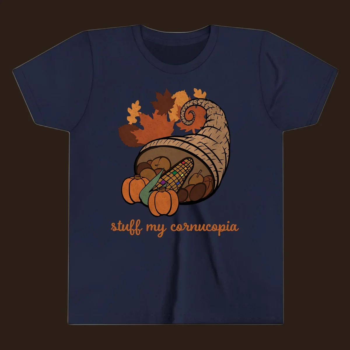 Cornucopia overflowing with harvest food and autumn leaves, with text 'stuff my cornucopia'.