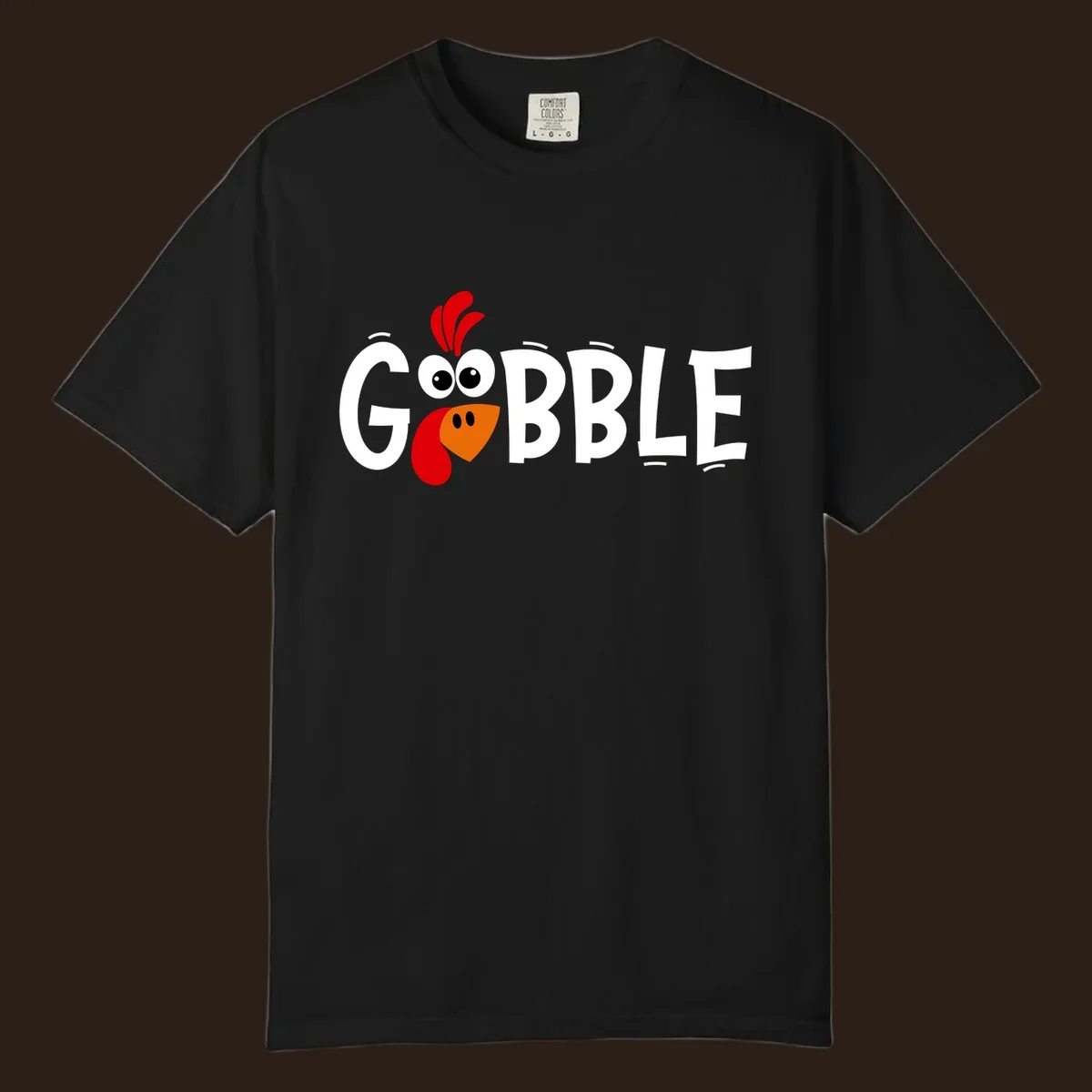 Gobble Gobble Turkey Face design with the word GOBBLE and a cartoon turkey face.