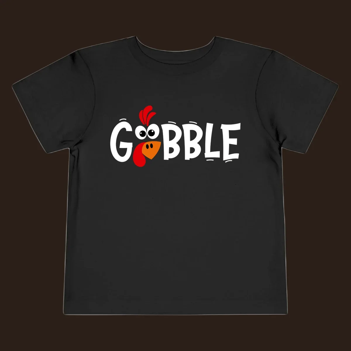 Gobble Gobble Turkey Face design with the word GOBBLE and a cartoon turkey face.