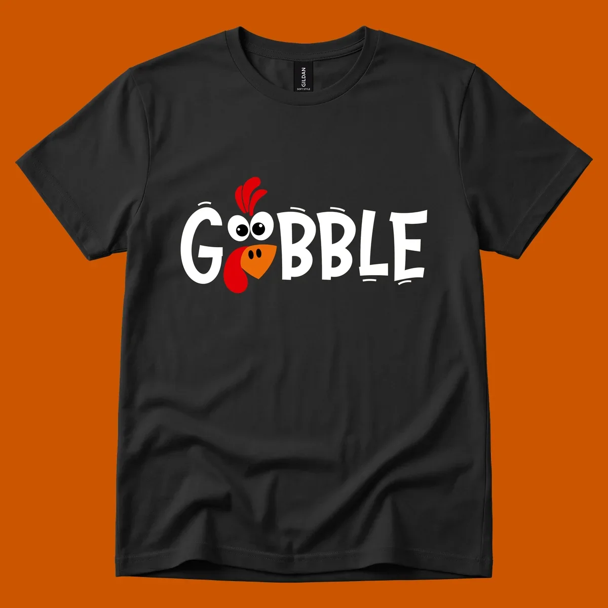 Gobble Gobble Turkey Face design with the word GOBBLE and a cartoon turkey face.