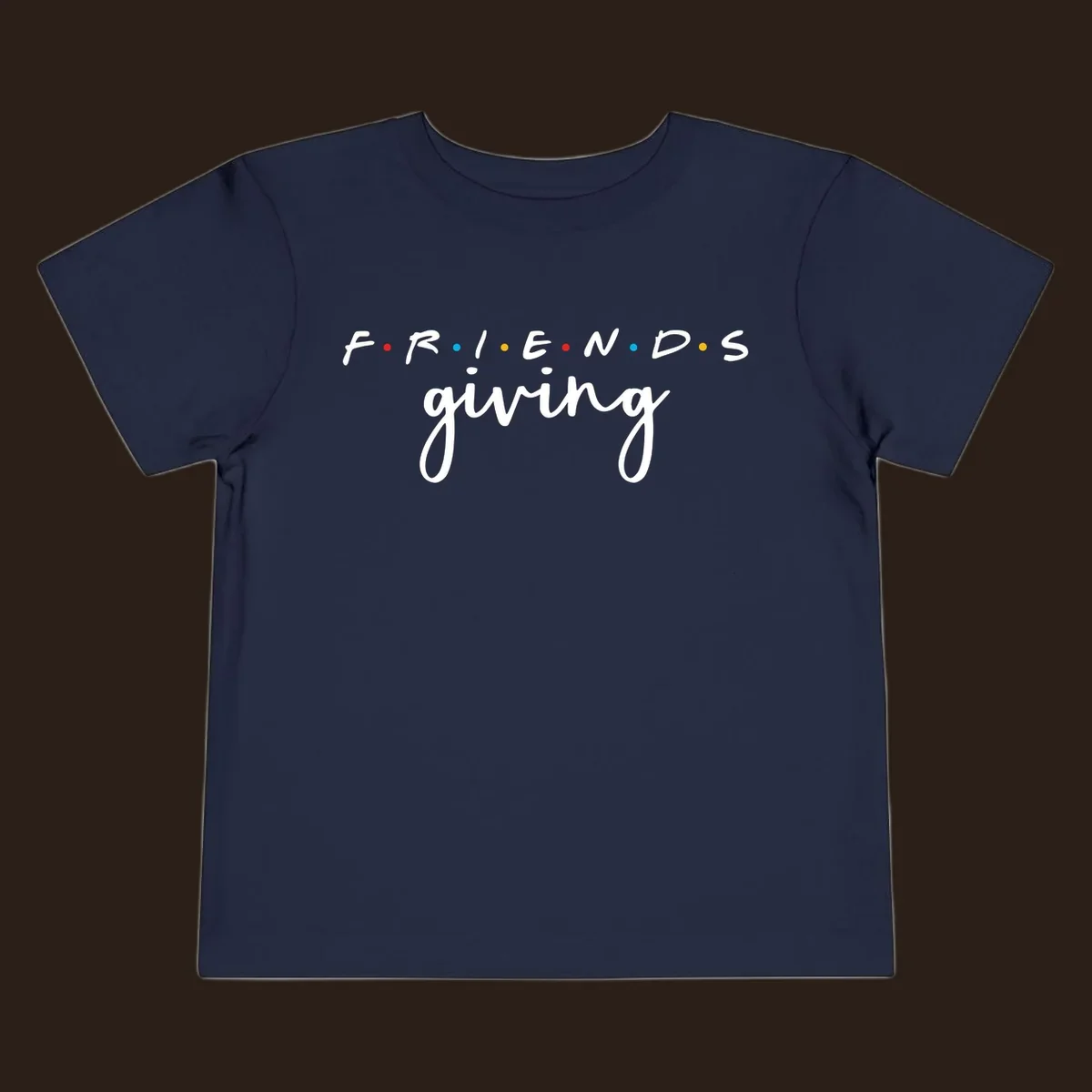 Friendsgiving typography design with the word FRIENDS in the iconic TV show font and giving in a script font.