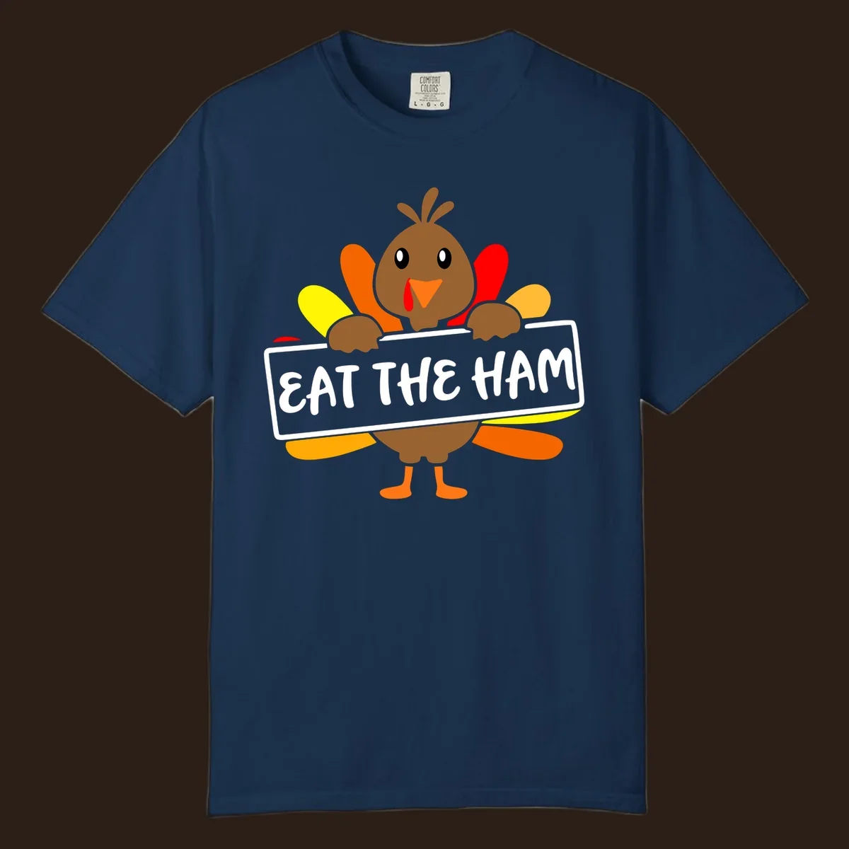 Cartoon turkey holding a sign that says EAT THE HAM, thanksgiving holiday.