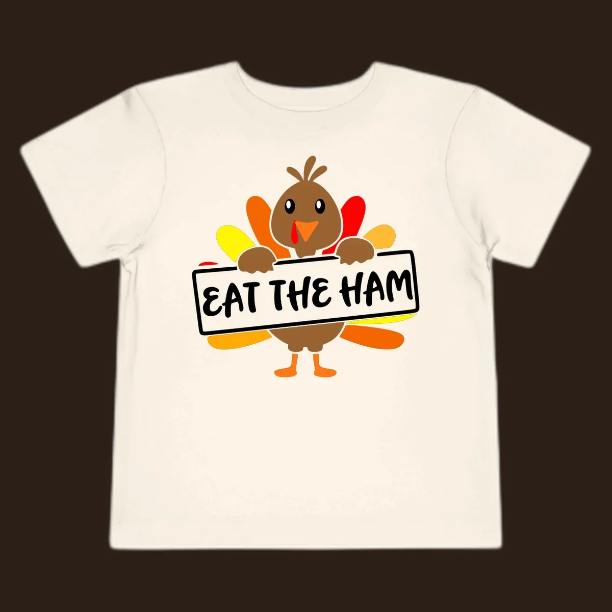 Cartoon turkey holding a sign that says EAT THE HAM, thanksgiving holiday.