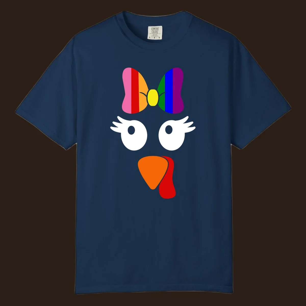 Rainbow turkey face with a bow, graphic for Thanksgiving.