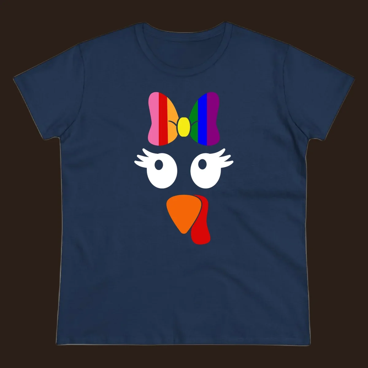 Rainbow turkey face with a bow, graphic for Thanksgiving.