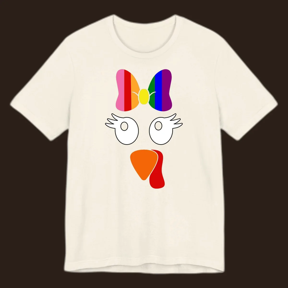 Rainbow turkey face with a bow, graphic for Thanksgiving.
