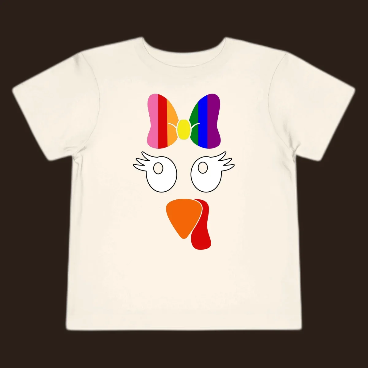 Rainbow turkey face with a bow, graphic for Thanksgiving.