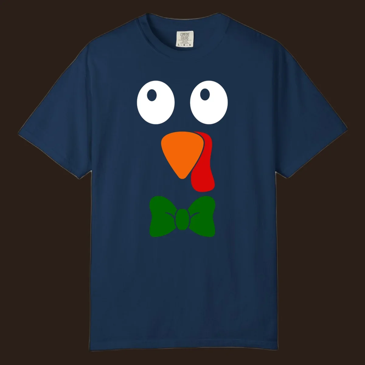Cute turkey face with bowtie graphic for Thanksgiving.