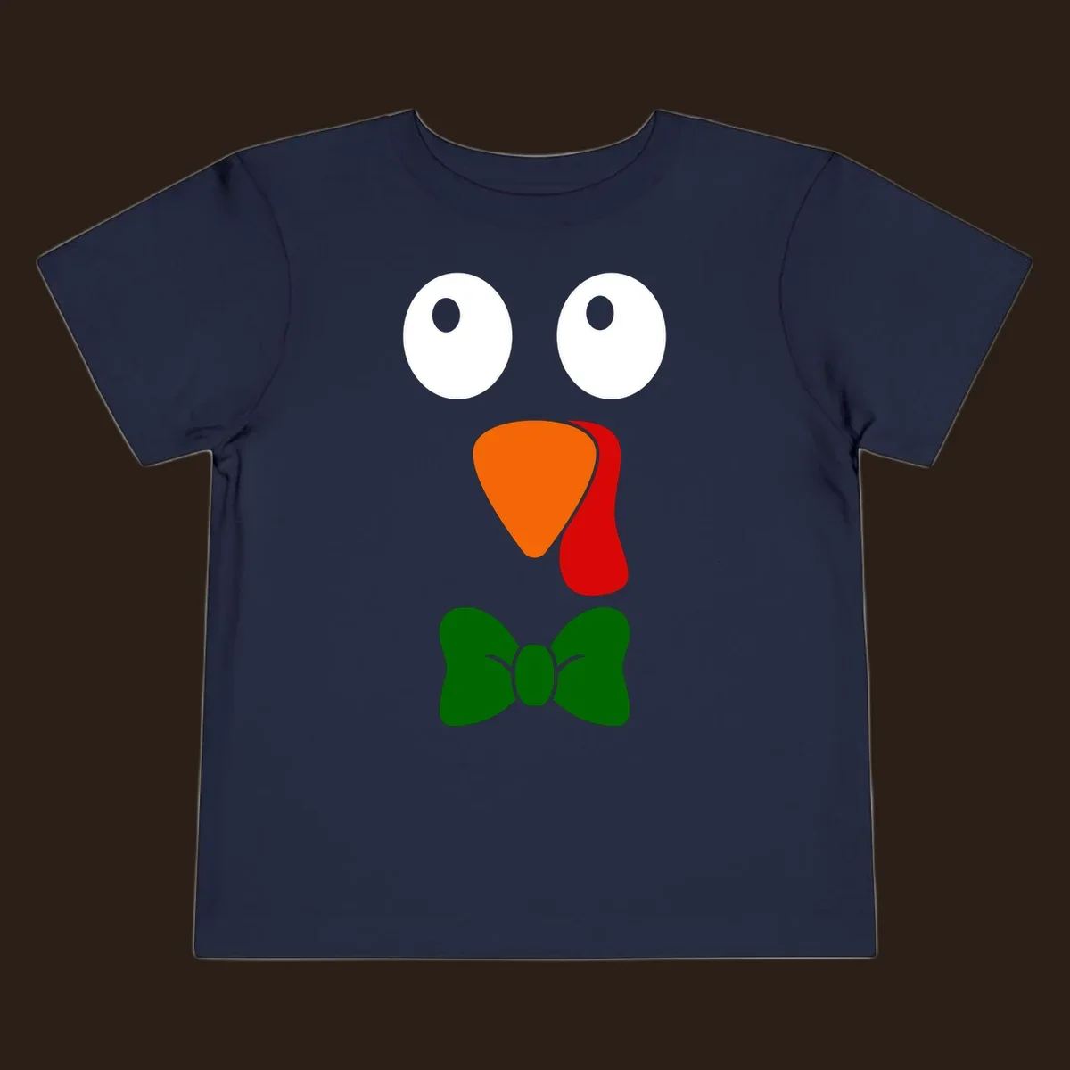 Cute turkey face with bowtie graphic for Thanksgiving.