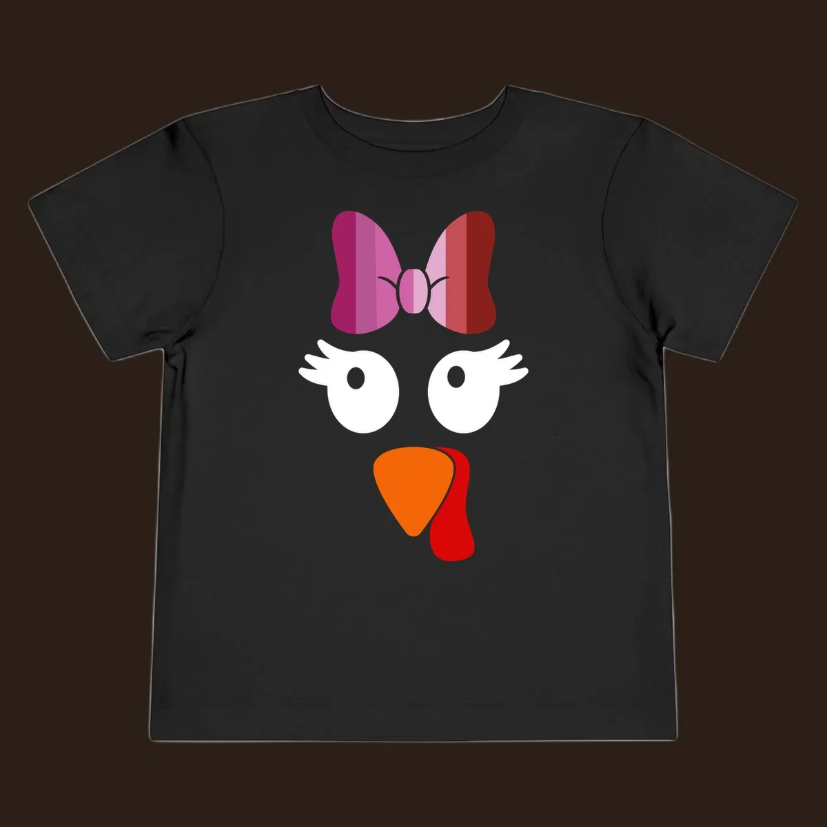 Cute lesbian turkey face with pink and purple bow. Thanksgiving graphic.