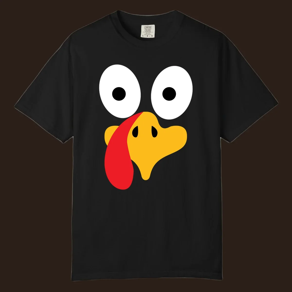 Googly-eyed turkey face illustration for Thanksgiving.