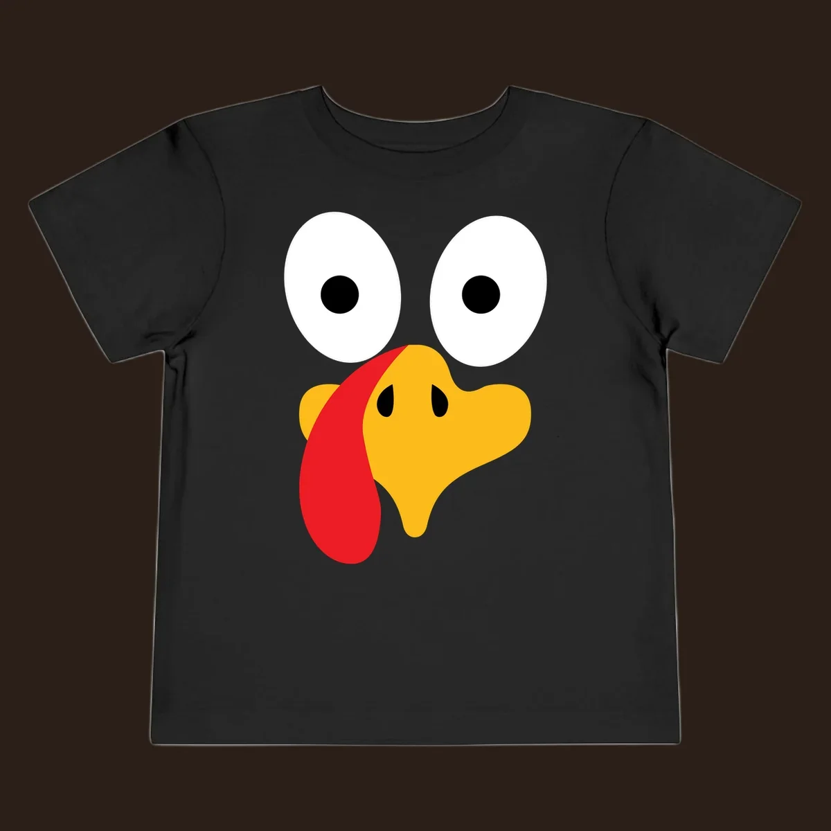 Googly-eyed turkey face illustration for Thanksgiving.