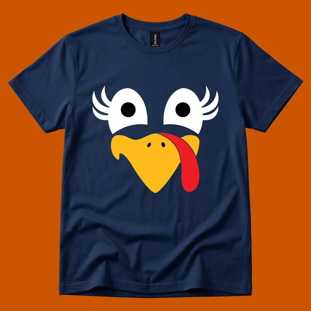Funny turkey face illustration with googly eyes and a red wattle, for Thanksgiving.