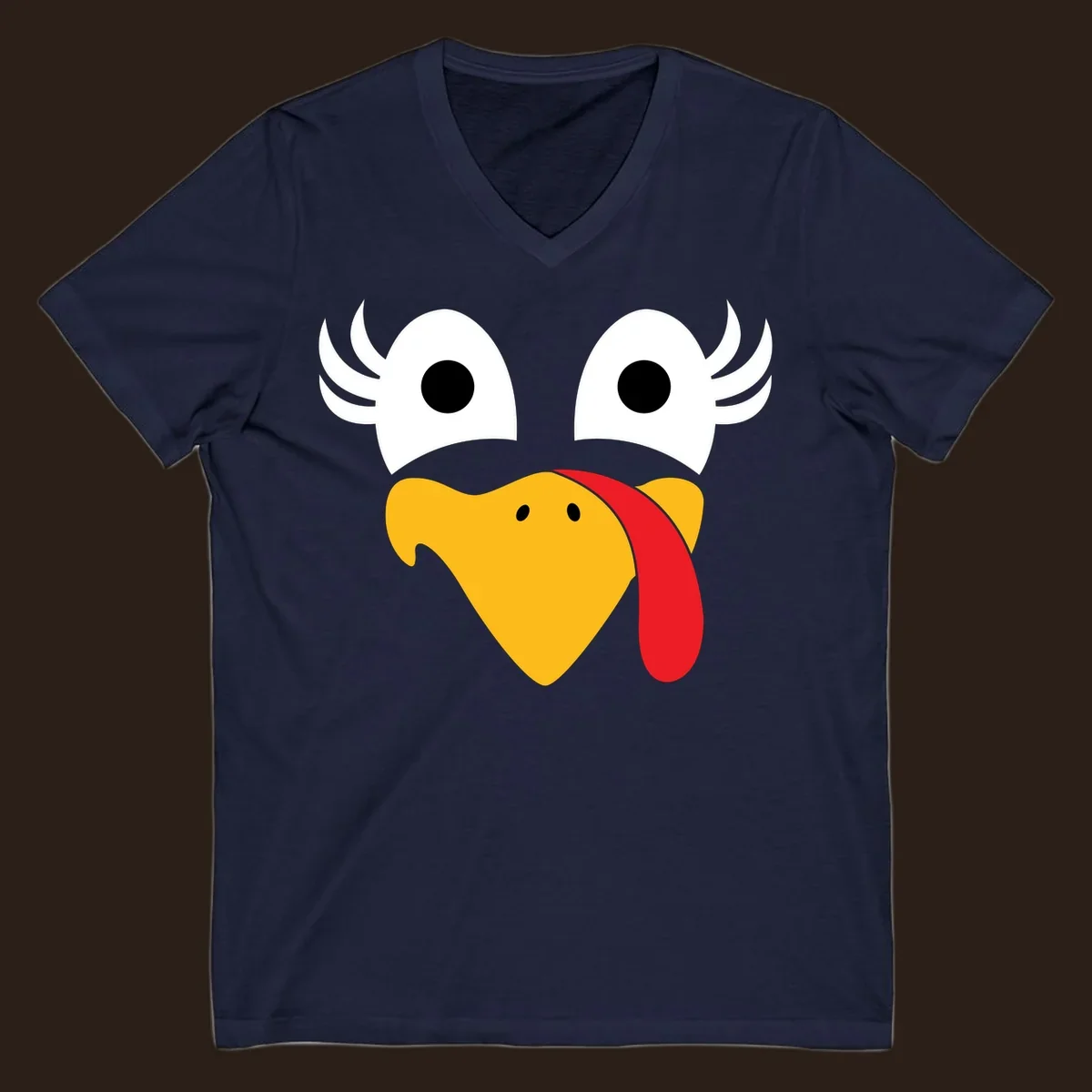 Funny turkey face illustration with googly eyes and a red wattle, for Thanksgiving.