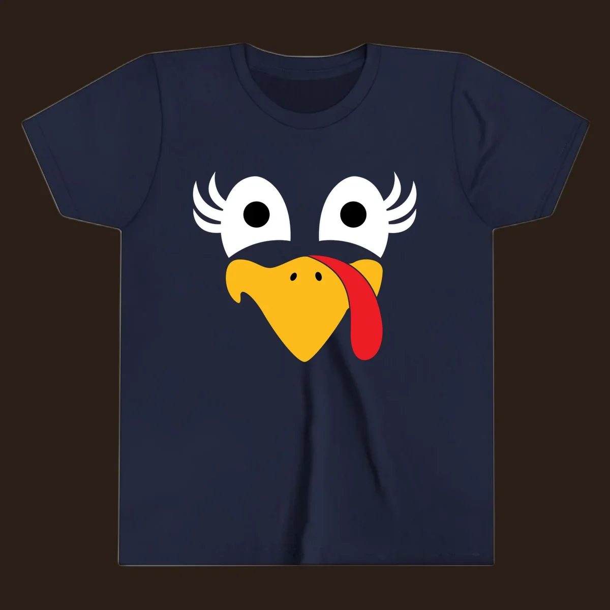 Funny turkey face illustration with googly eyes and a red wattle, for Thanksgiving.