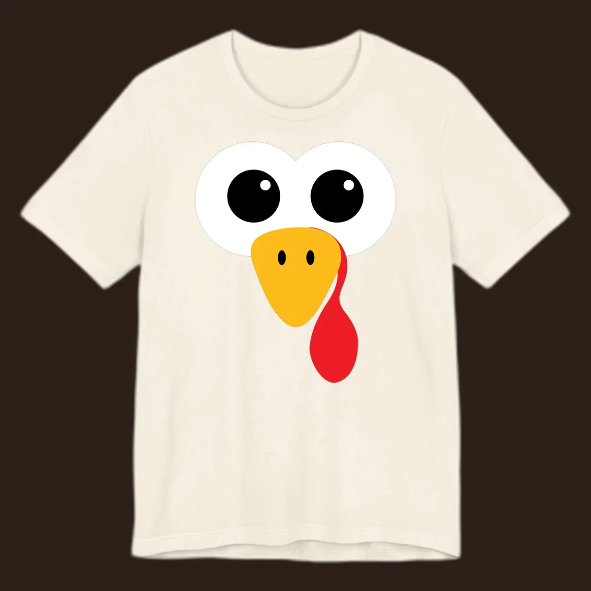 Funny turkey face with googly eyes, yellow beak, and red wattle for Thanksgiving.