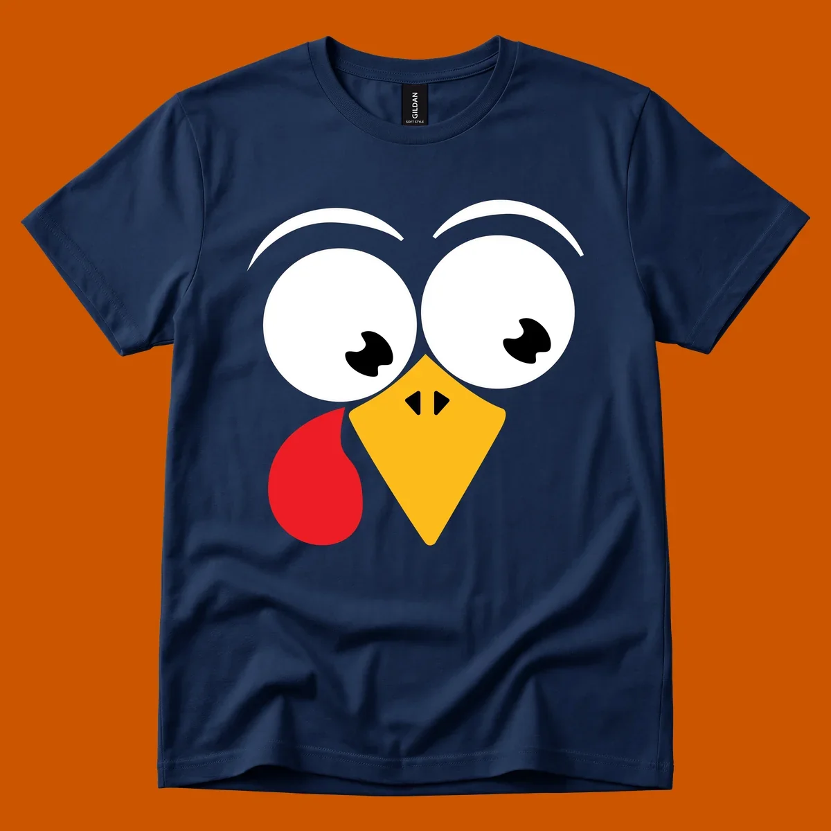 Googly eyed turkey face with yellow beak and red wattle on black background.