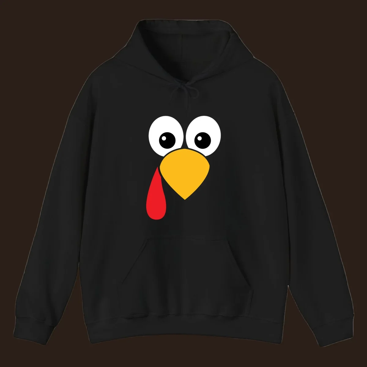 Funny turkey face illustration with big eyes, yellow beak, and red wattle for Thanksgiving.